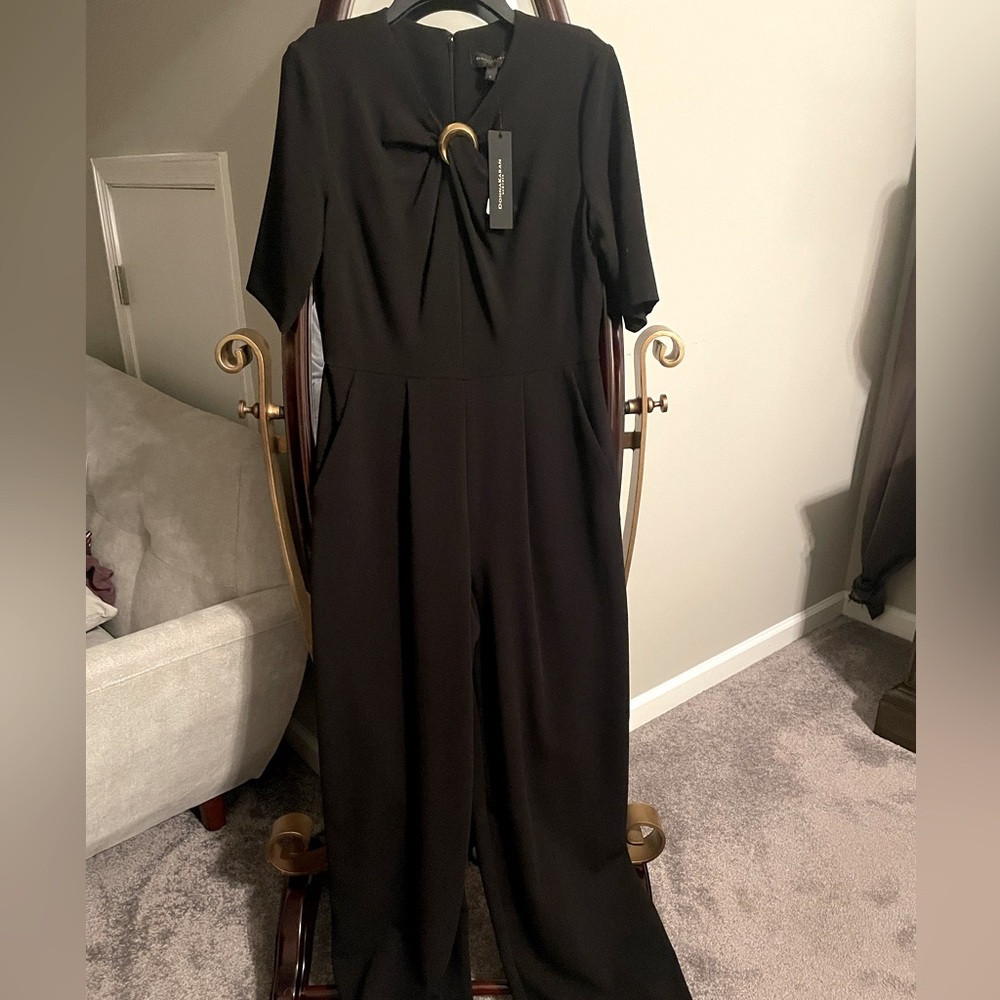 Donna Karan black jumpsuit. Size 6, never worn. Back zipper, pockets, wide legs.